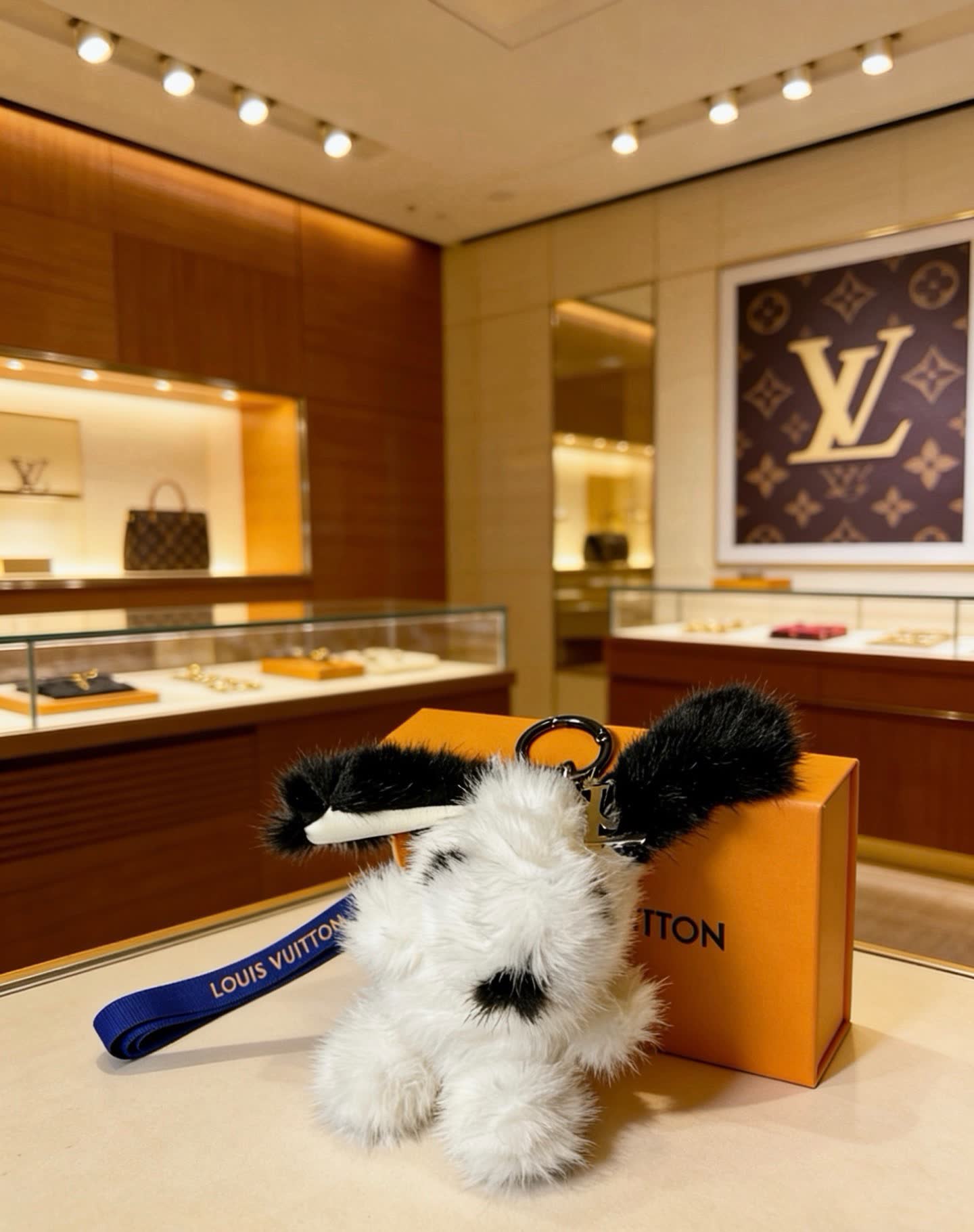 Louis Vuitton White and Black Furry Keychain